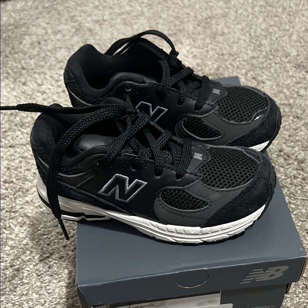 New Balance Kids Black and White Sneakers